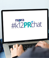 Computer displaying #k12PRChat logo